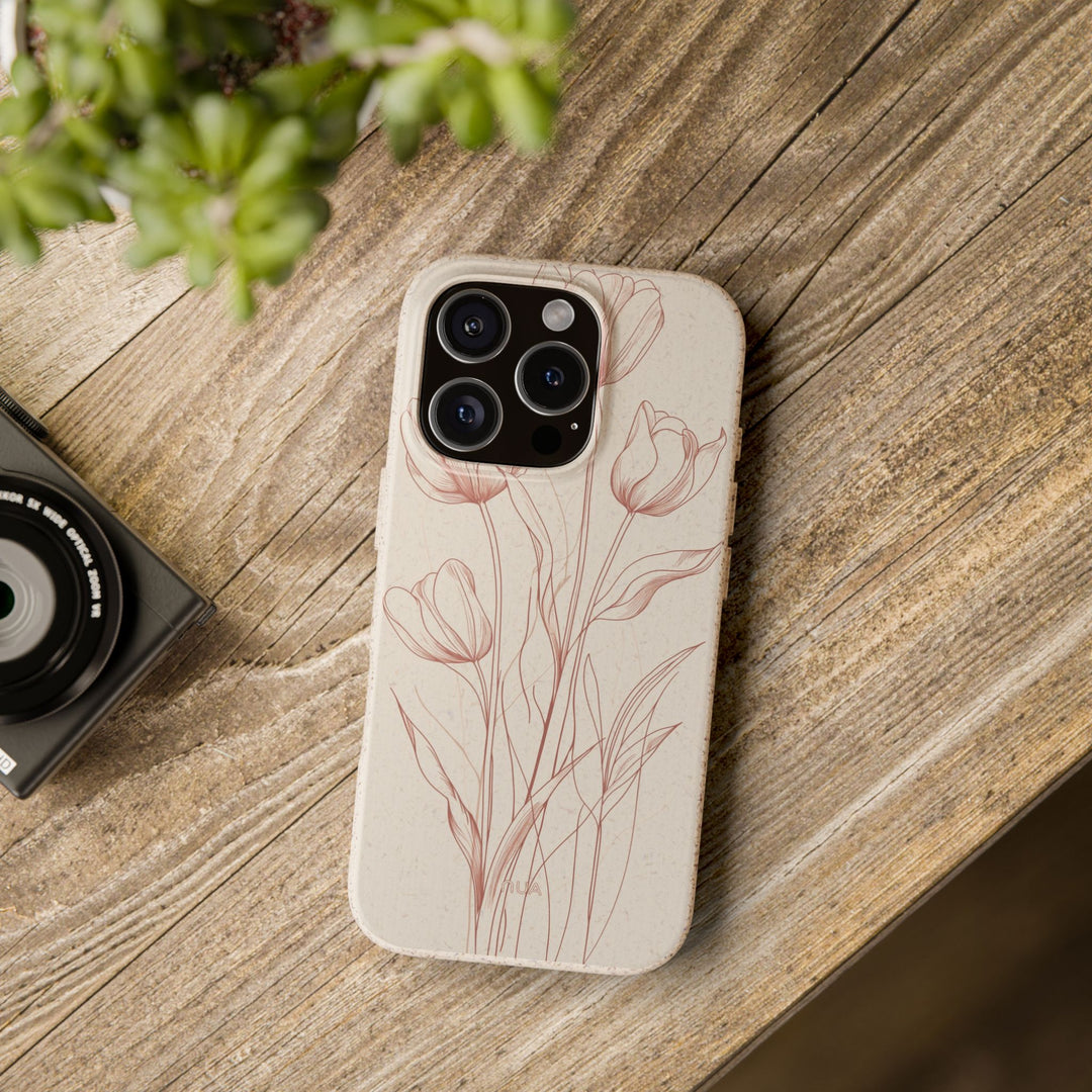 Eco-friendly red line art floral phone case on a wooden table, compatible with many iPhone and Samsung models, durable and stylish.