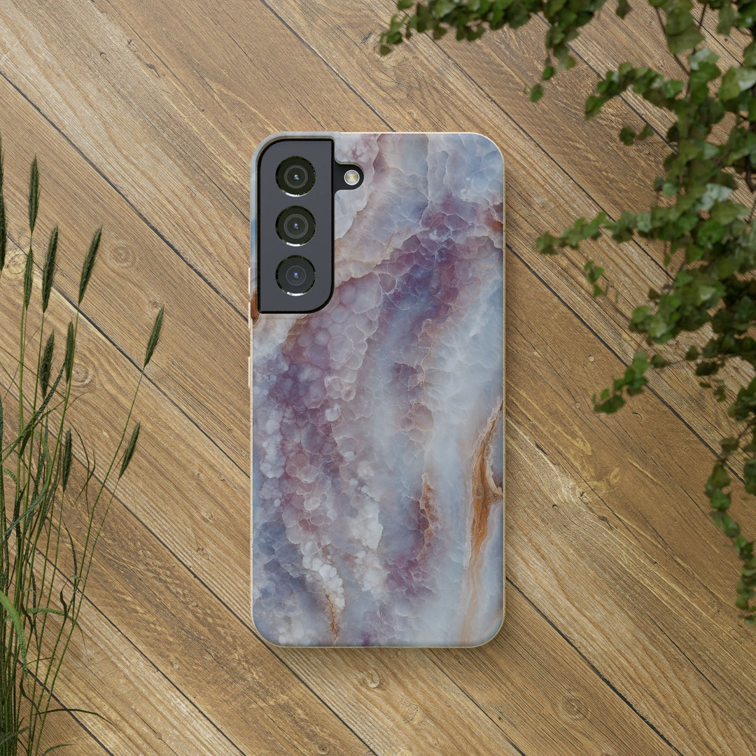 Eco-friendly biodegradable Samsung case with marble design, nestled on a wooden surface, perfect for sustainability-focused consumers.