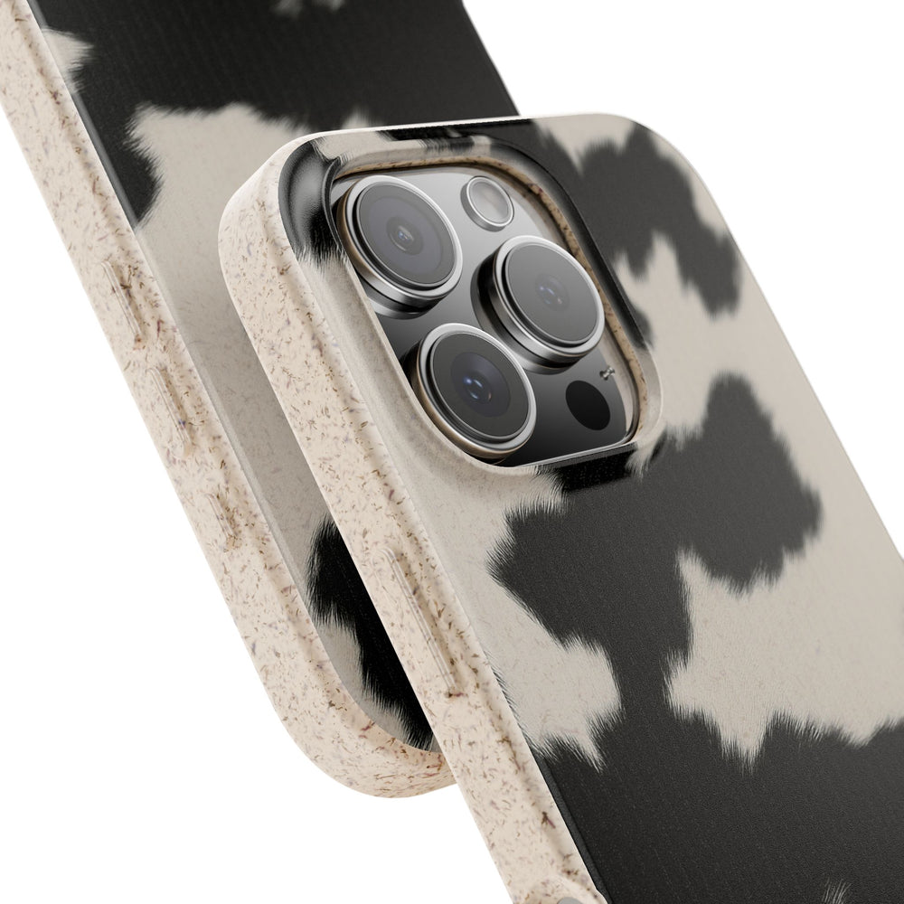 Eco-friendly biodegradable iPhone case with stylish cow print, fits many iPhone and Samsung models, durable matte finish.