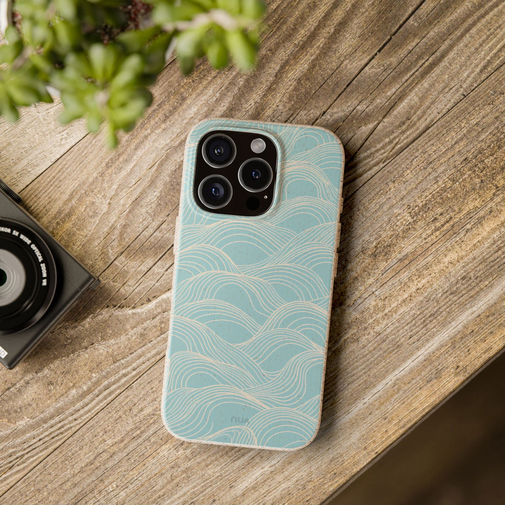 Eco-friendly blue wave design phone case for iPhone and Samsung, durable and stylish with unique pattern, perfect for tech lovers.