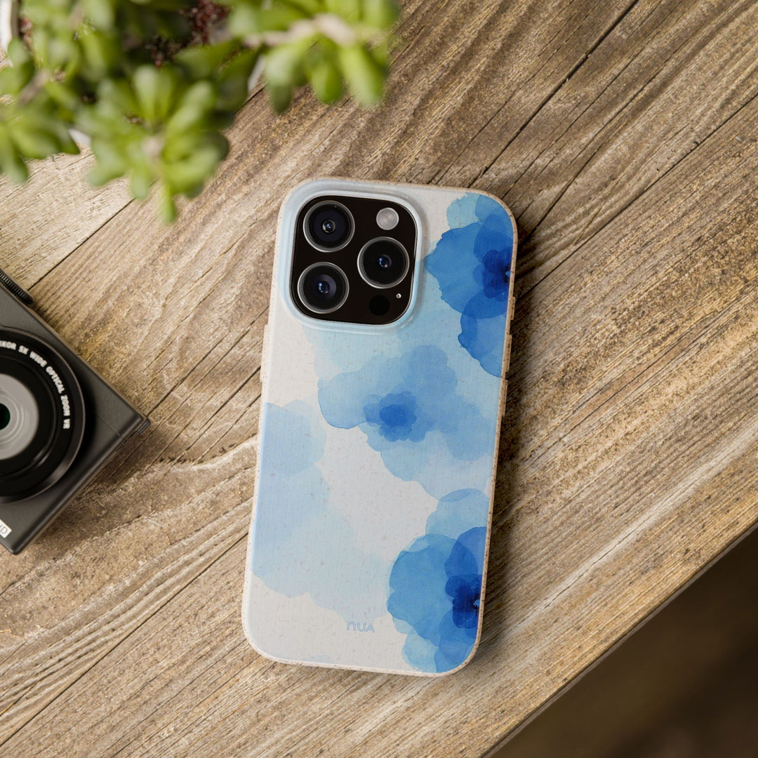 Alt Tag: Eco-friendly watercolor blue iPhone case with floral design, durable protection for multiple models.