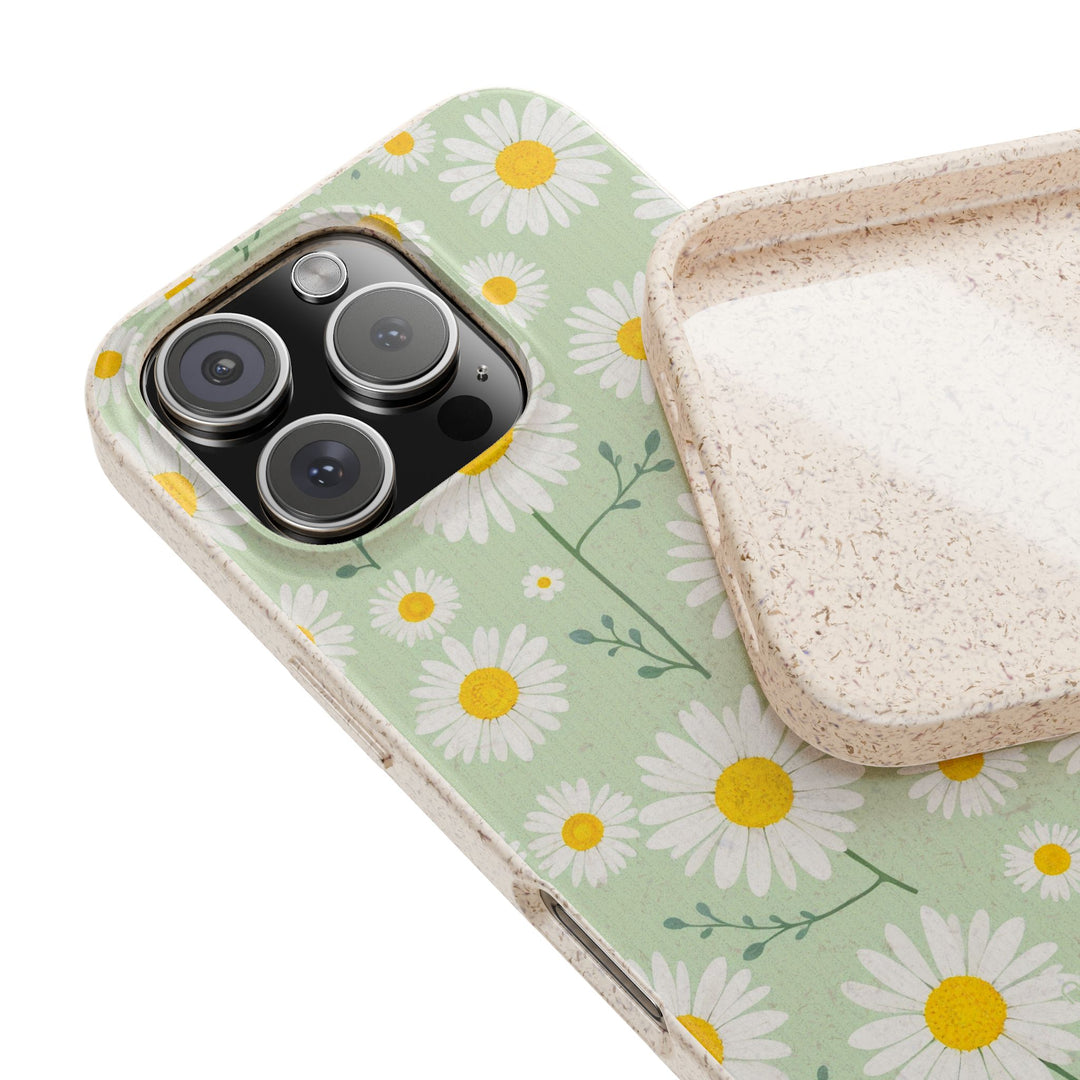 Eco-friendly daisy phone case with a biodegradable floral design, perfect for durable protection on iPhone and Samsung models.