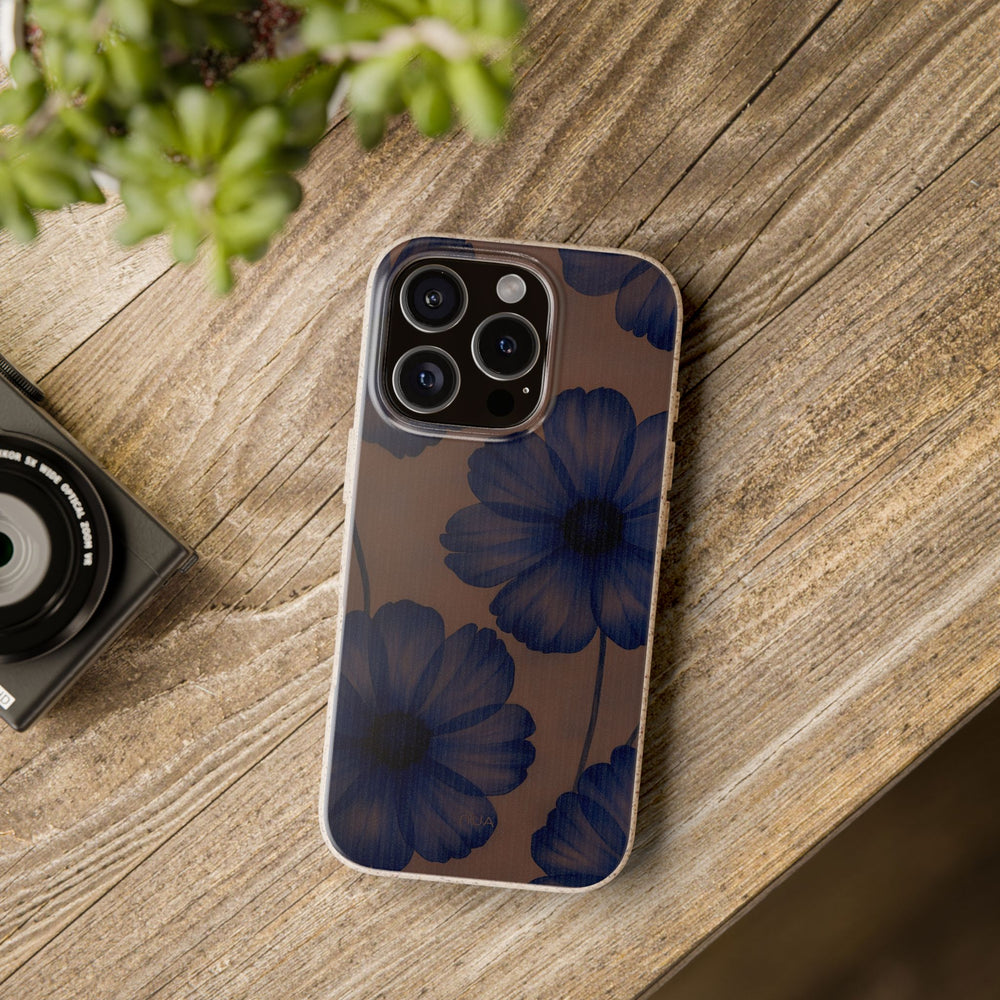 Eco-friendly Midnight Petals phone cover with deep blue flowers on mauve, compatible with many iPhone and Samsung models.