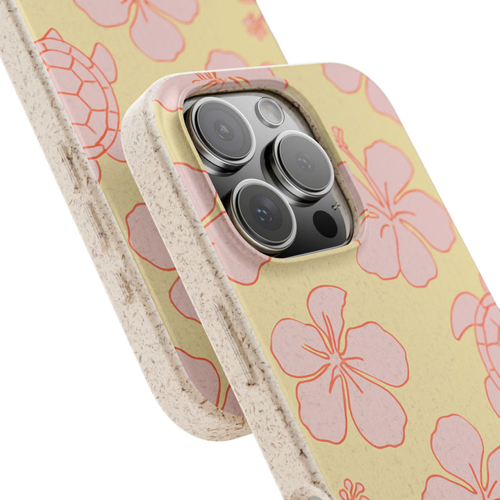 Eco-friendly Island Bloom & Turtle Trails iPhone case, featuring a vibrant floral and turtle design, compatible with many models.