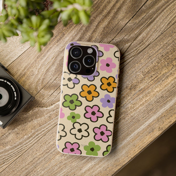 Doodle Bloom Delight iPhone Case with eco-friendly floral design, showcasing vibrant colors for various iPhone and Samsung models.
