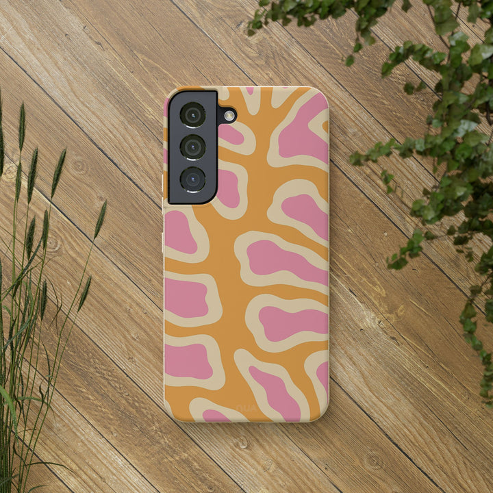 Bright abstract retro design Samsung case, biodegradable and eco-friendly, suitable for many iPhone and Samsung models, on wooden surface.