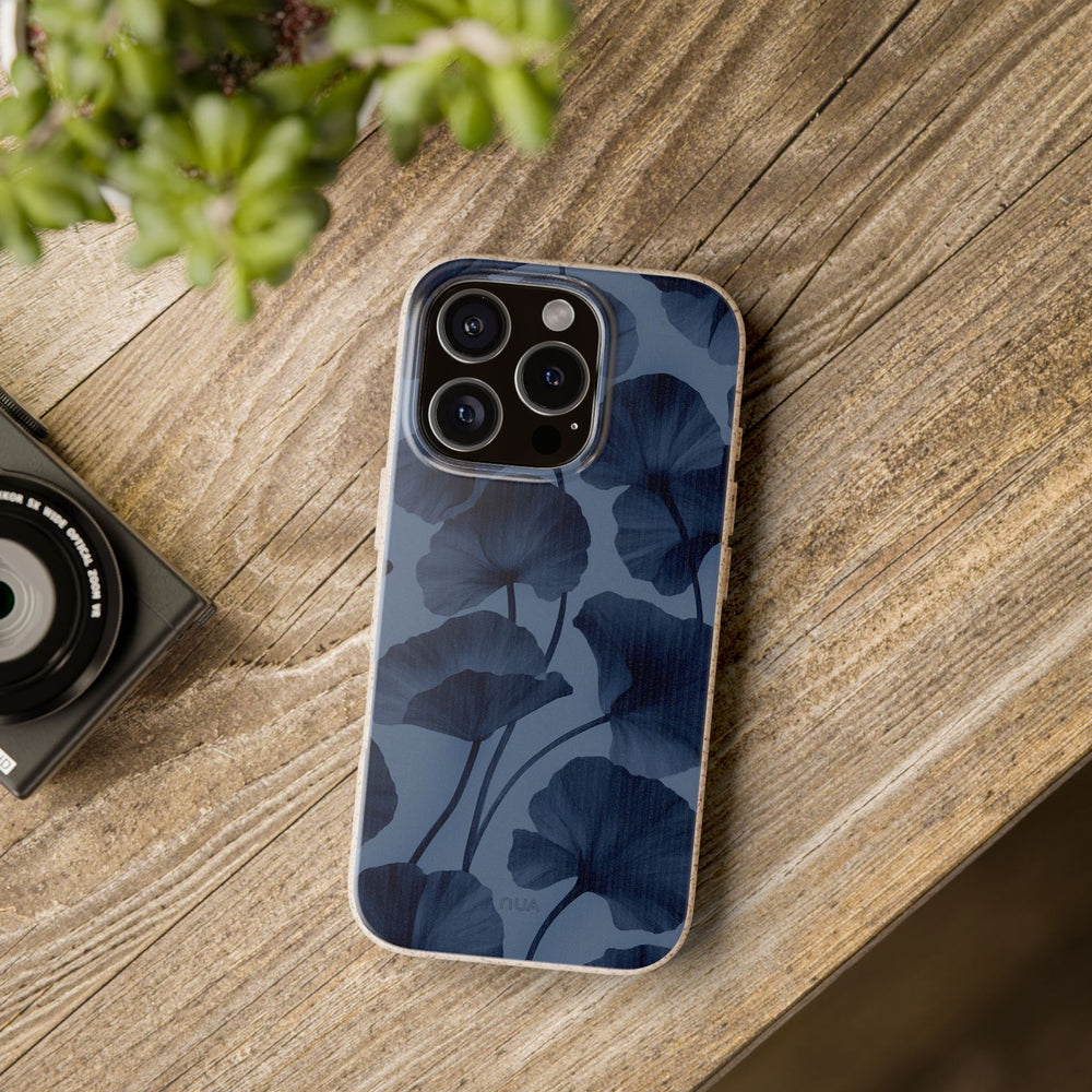 Midnight Bloom iPhone case with eco-friendly, durable design on wooden table, suitable for many iPhone and Samsung models.