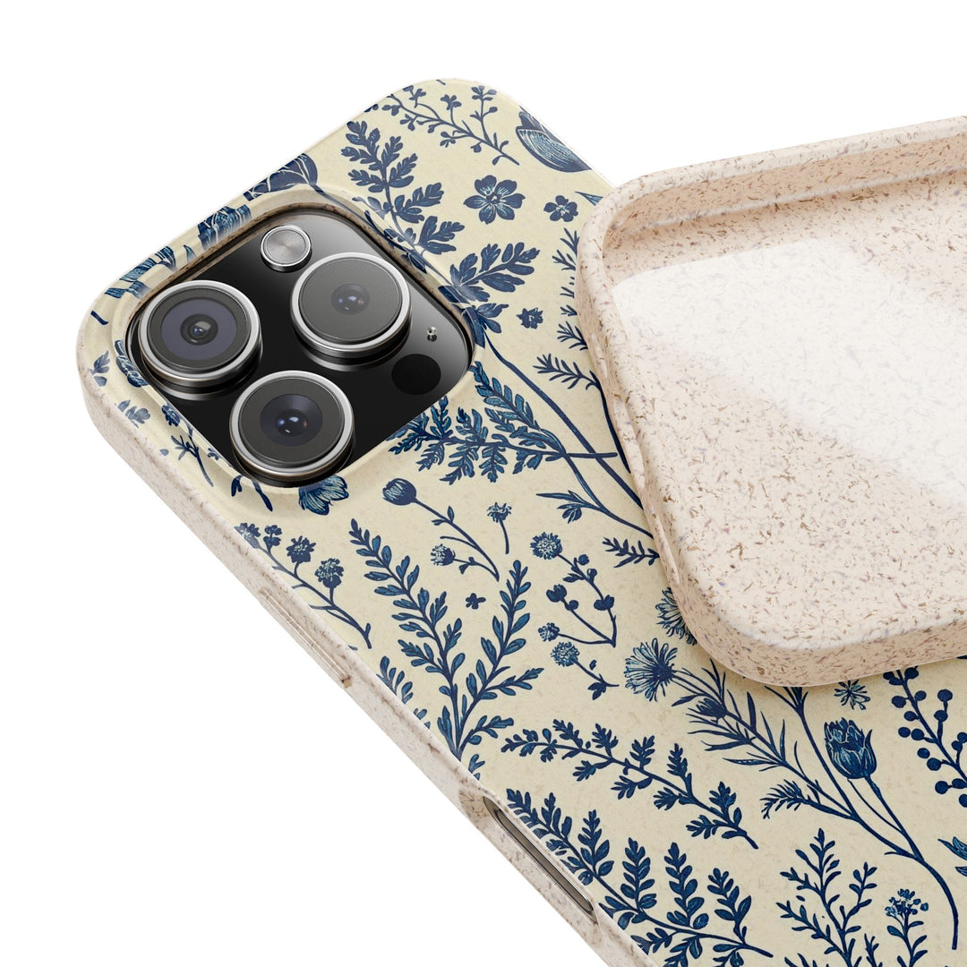 Eco-friendly phone case with blue floral design for iPhone, crafted from biodegradable materials; fits many iPhone and Samsung models.