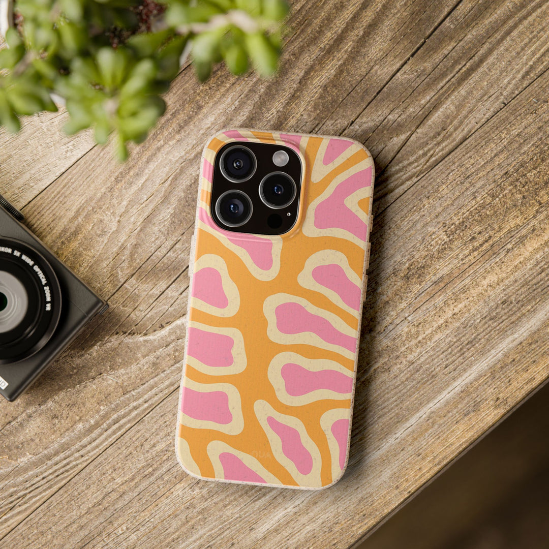 Eco-friendly retro iPhone case with vibrant abstract design on wooden table, perfect for many iPhone and Samsung models.