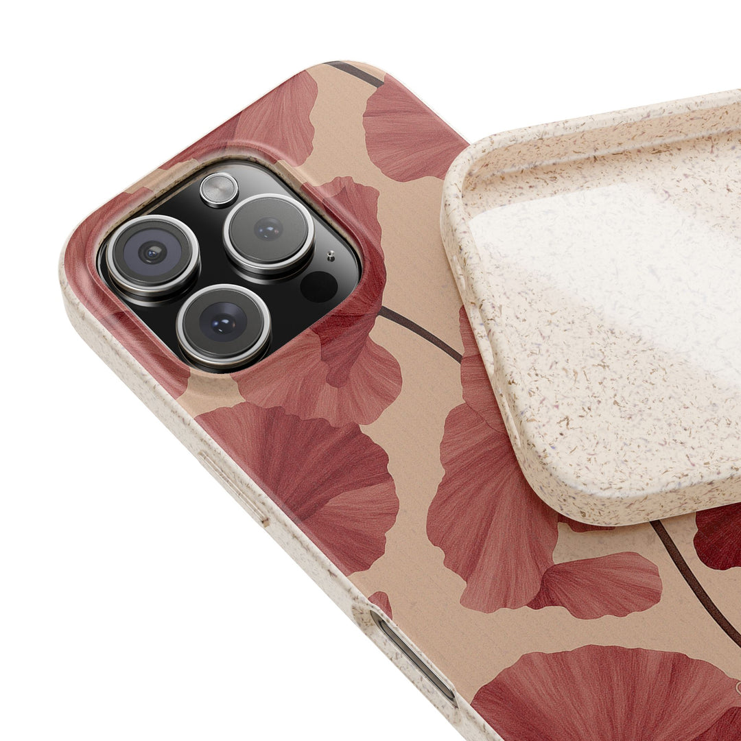 Luxury red floral design phone case for iPhone/Samsung, eco-friendly, durable, biodegradable, vibrant colors, impact-absorbing.