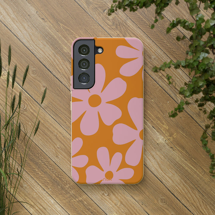 Bright floral Samsung case on wood background, eco-friendly and durable design; fits many iPhone and Samsung models.