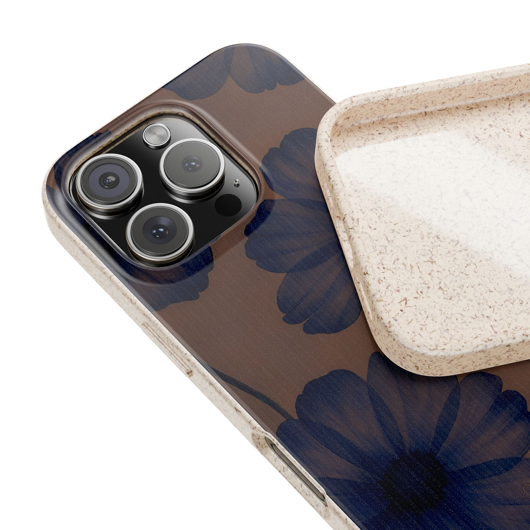 Eco-friendly phone case with deep blue flowers on mauve, fitting many iPhone and Samsung models. Durable and stylish accessory.