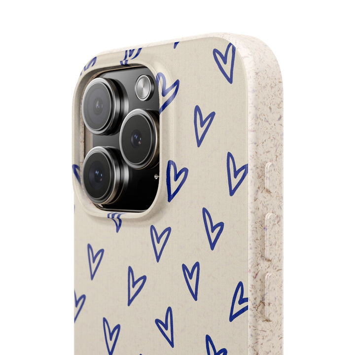 Eco-friendly iPhone case with heart pattern, biodegradable, fits many iPhone and Samsung models, durable and stylish.