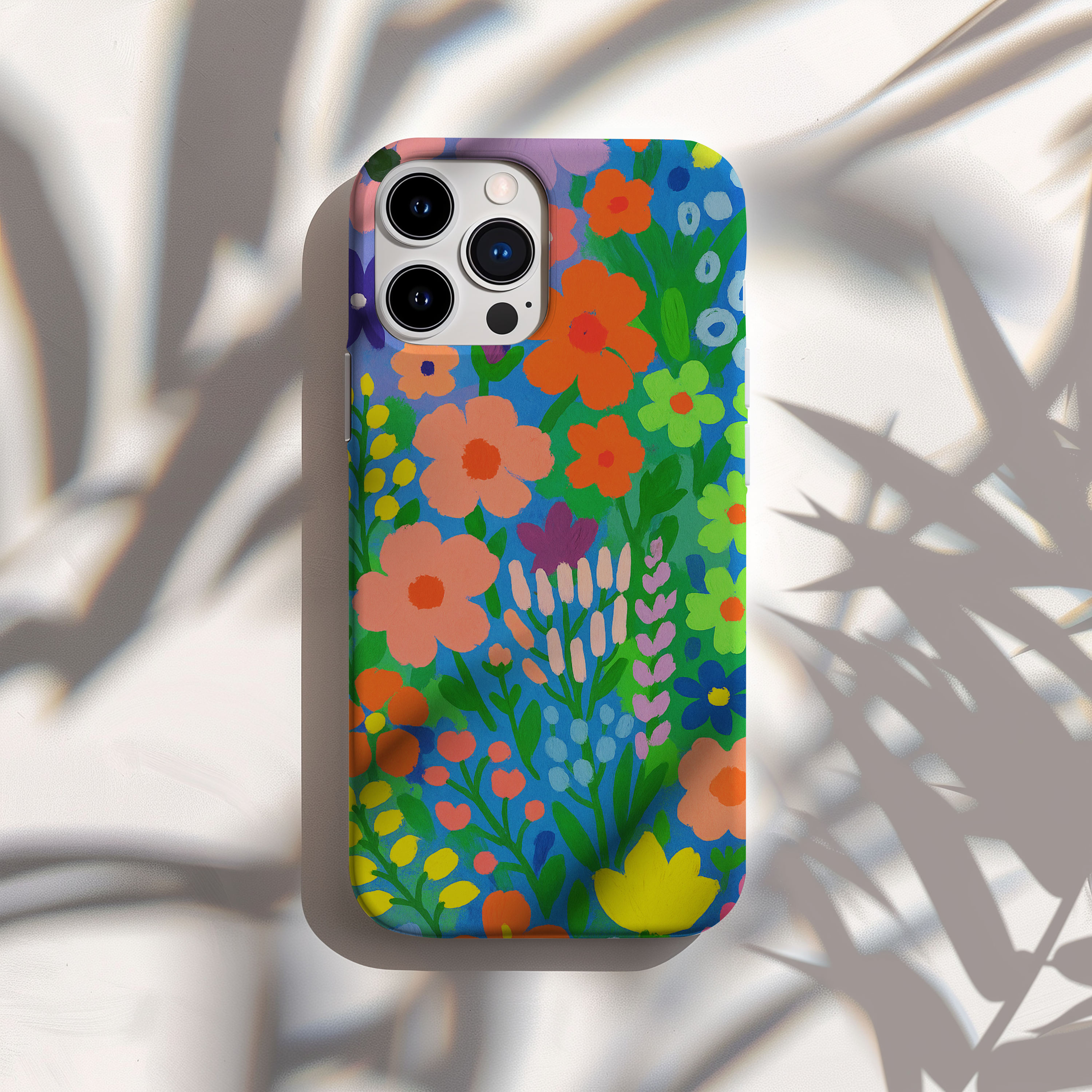 Eco-friendly floral iPhone case with vibrant colors, biodegradable, durable, fits many iPhone & Samsung models.