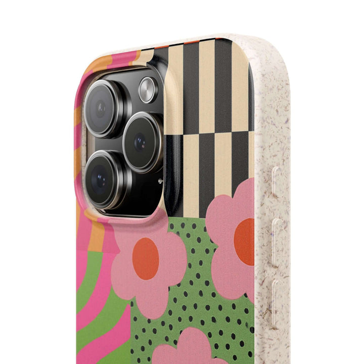 Groovy Garden Retro Patchwork iPhone Case with floral and striped patterns, eco-friendly, stylish, and durable design.