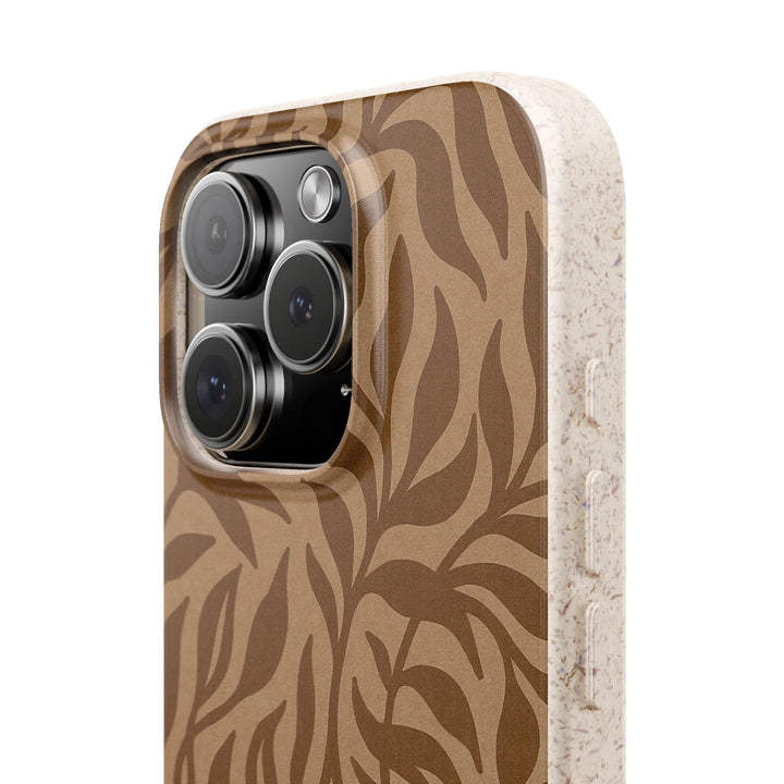 Eco-friendly iPhone case with rustic jungle design, showcasing brown leafy pattern and durable biodegradable material for various models.