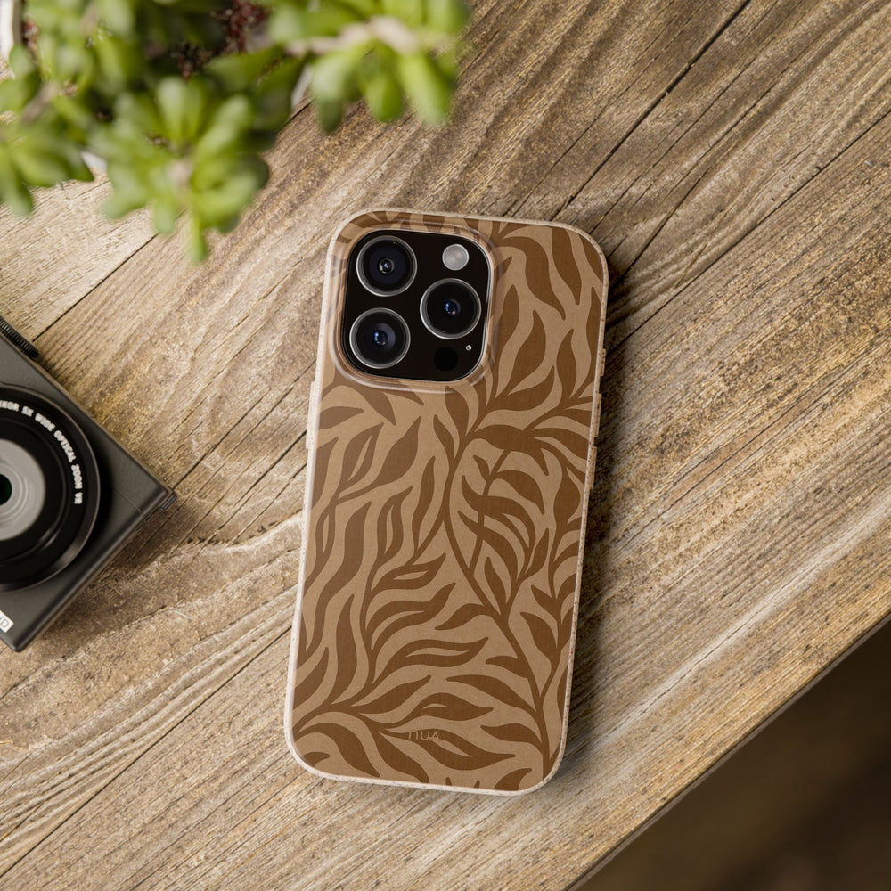 Rustic Jungle Flow iPhone Case on wood surface, eco-friendly and biodegradable, fits many iPhone and Samsung models, durable design.